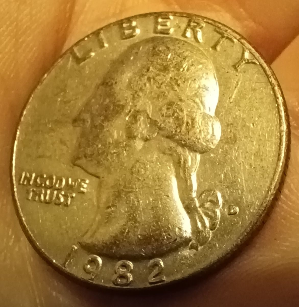 1982-Quarter-With-Copper-Showing-Through-Face.-Cladding-Error?